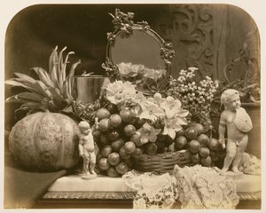 Stilleven van Fruit met Spiegel en Beeldjes, 1860